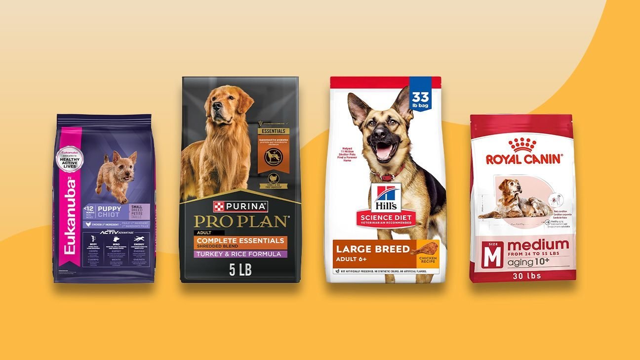 Three different bowls of dog food formulated for specific canine life stages.