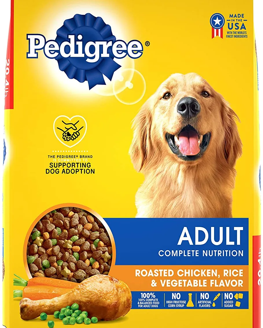 Four dog food bags arranged by size on oak floor