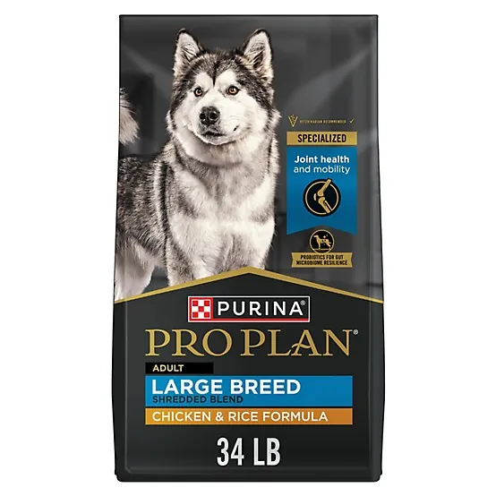 Large bag of dog food stored inside an airtight container on a tile floor.
