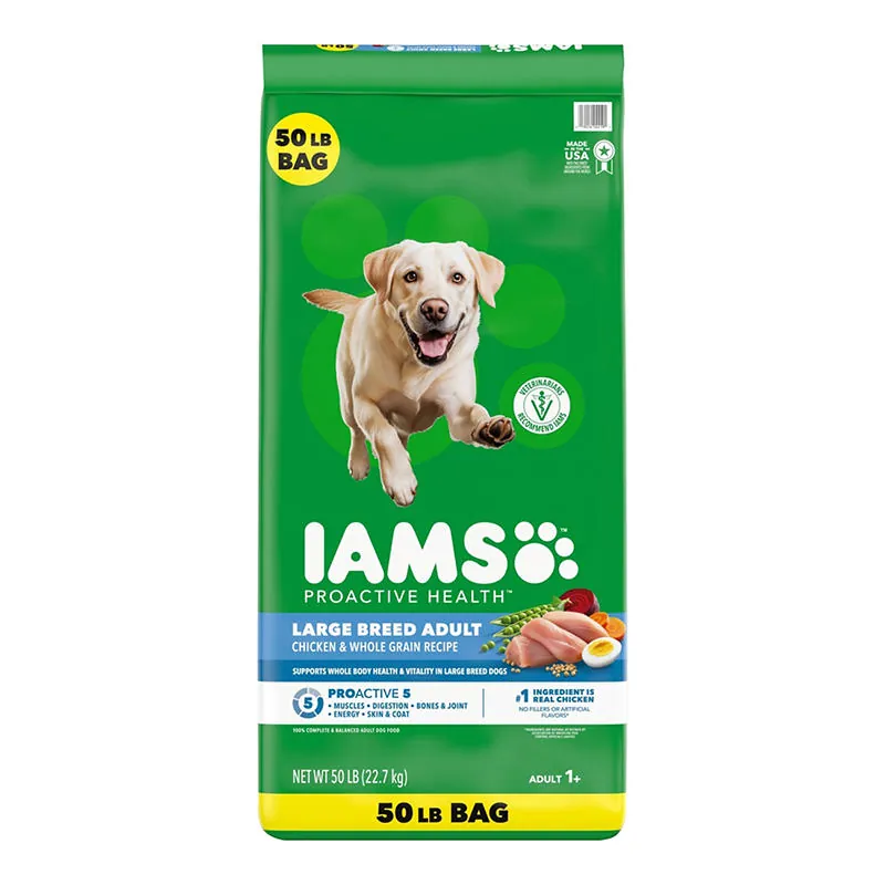 Spilled dog food on a pantry floor near an open storage bin.